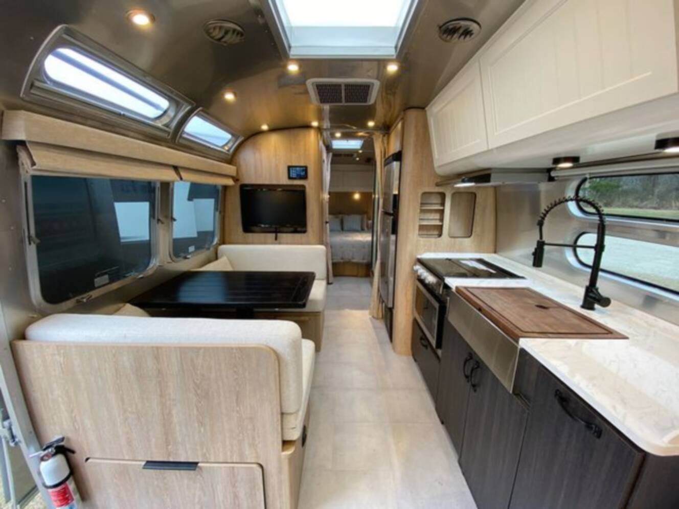 A photo of this 2024 Airstream Pottery Barn 28RBQ