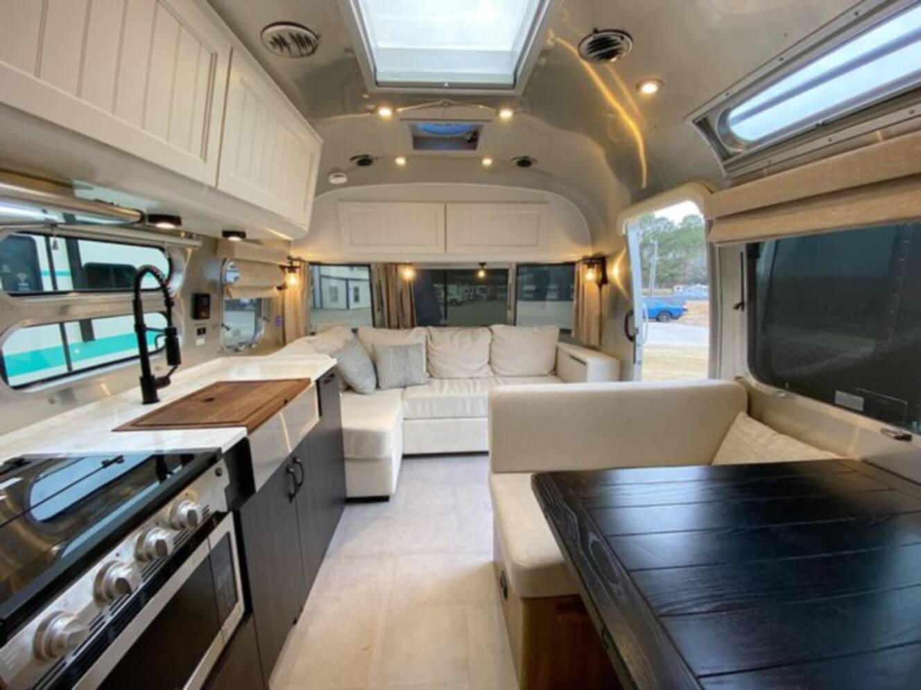 A photo of this 2024 Airstream Pottery Barn 28RBQ