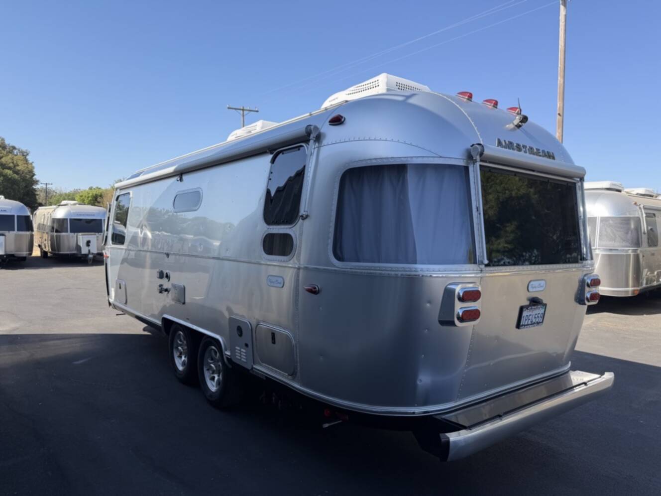 A photo of this 2023 Airstream FLYING CLOUD 25RB QUEEN