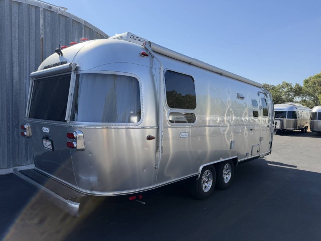 A photo of this 2023 Airstream FLYING CLOUD 25RB QUEEN