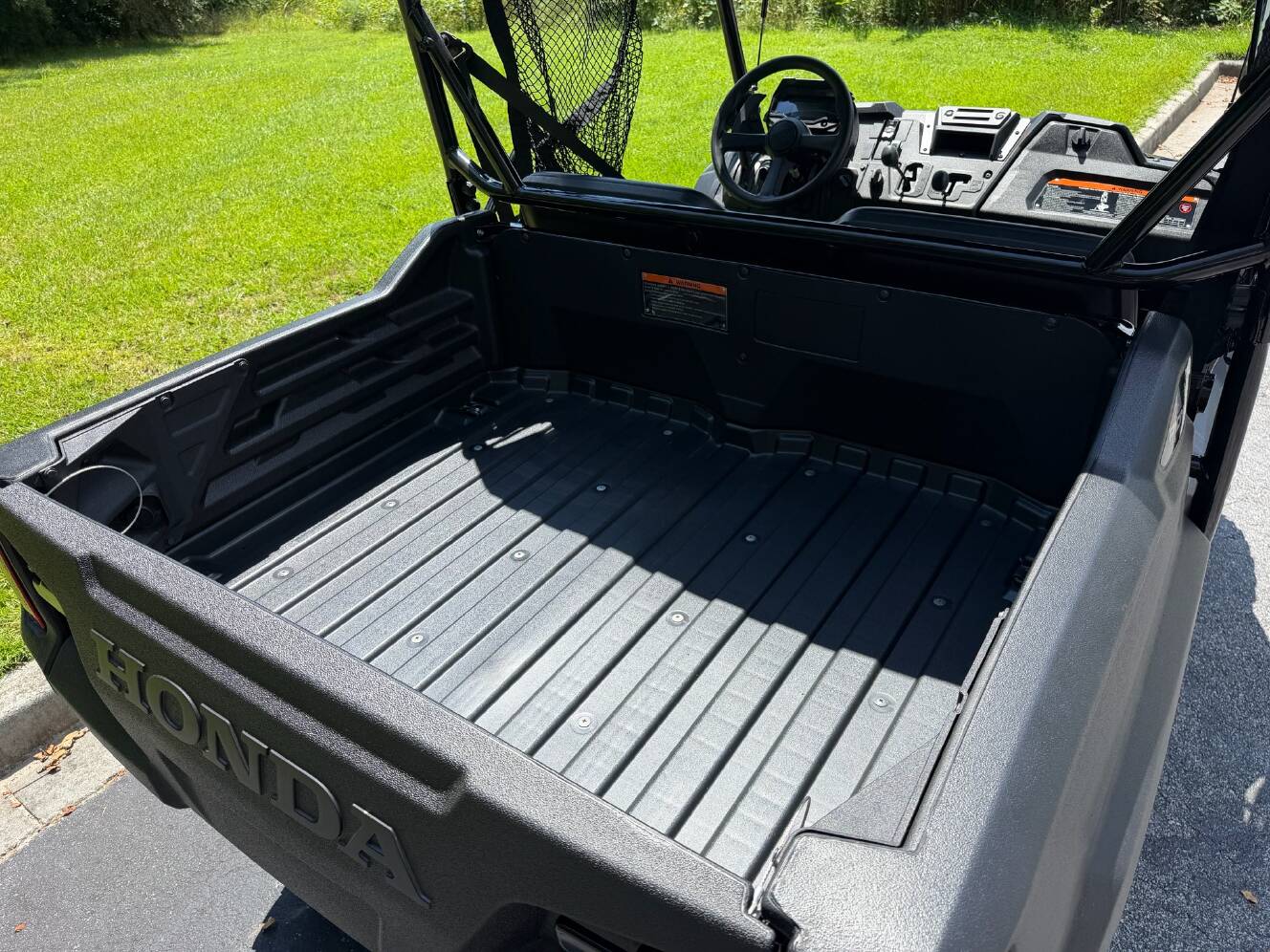A photo of this 2026 Honda Pioneer 700 Deluxe