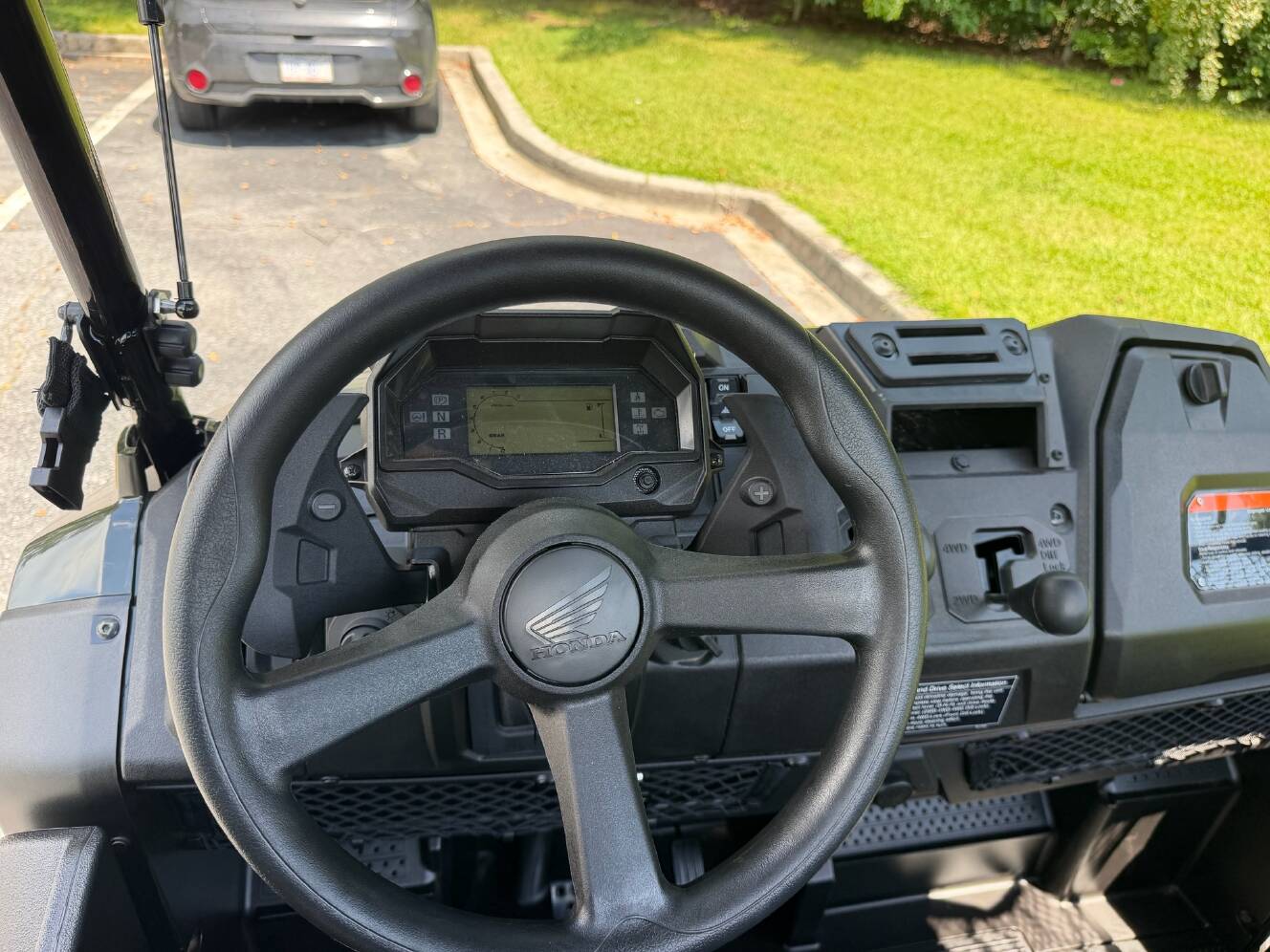 A photo of this 2026 Honda Pioneer 700 Deluxe