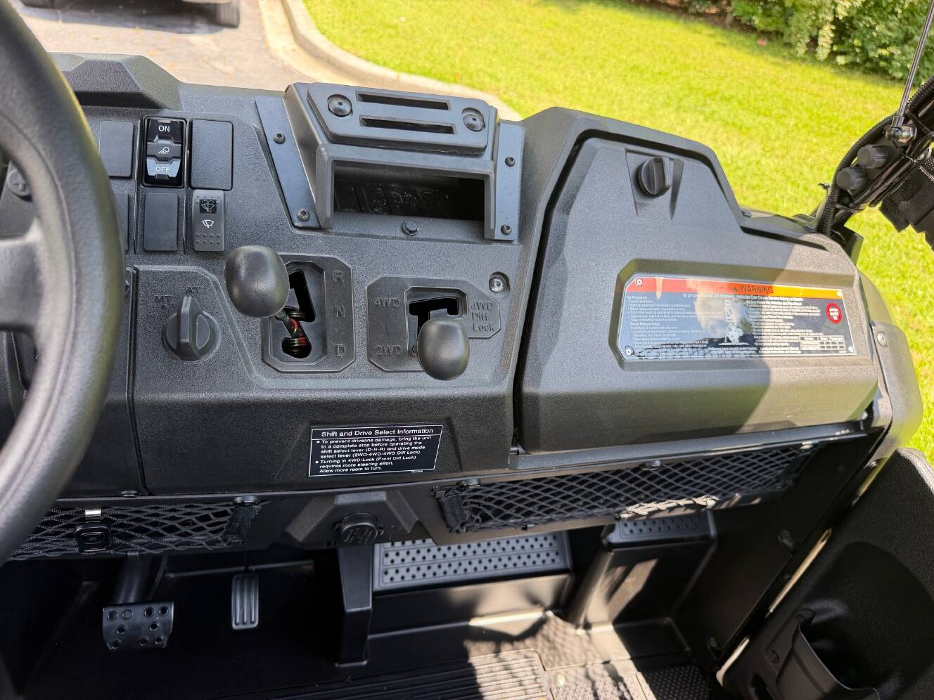 A photo of this 2026 Honda Pioneer 700 Deluxe