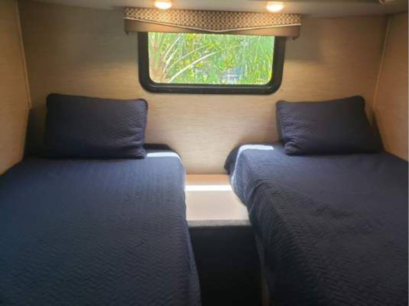 A photo of this 2023 Thor Motor Coach Axis 24.1