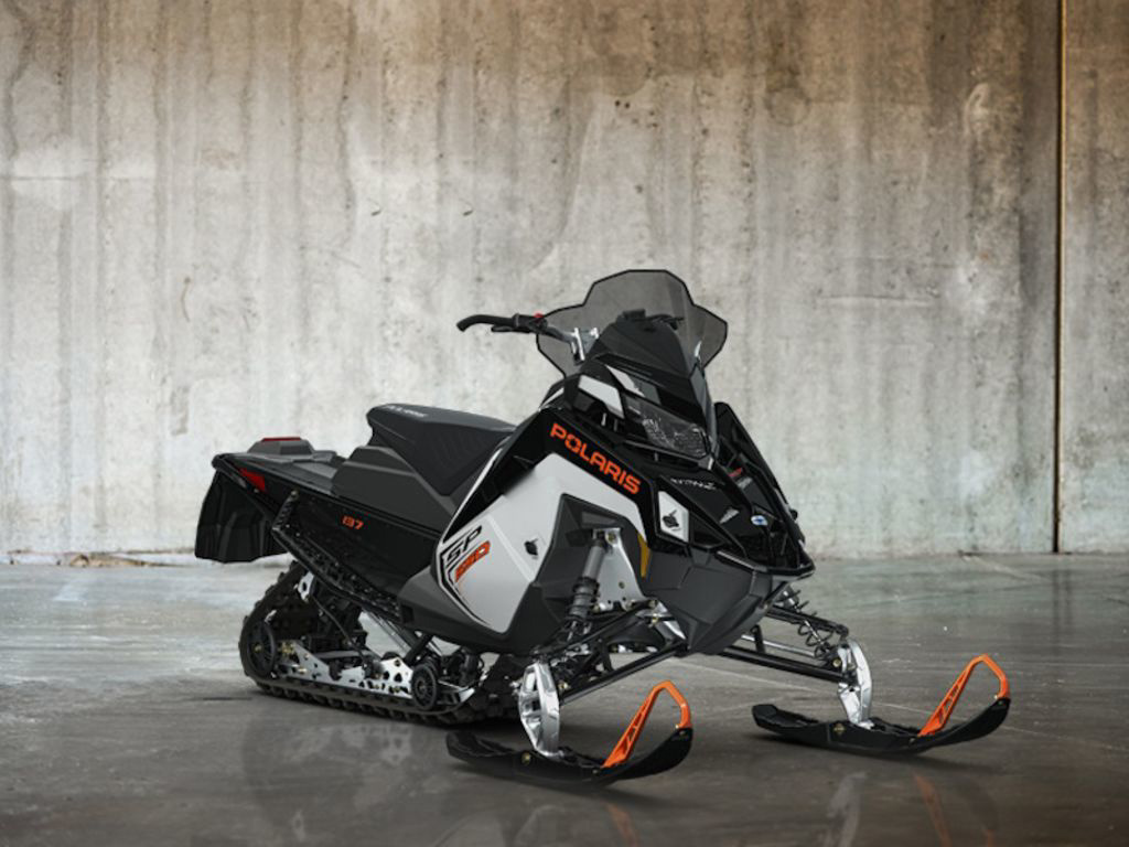 2027 Polaris  650 INDY SP 137 White Lightning / Gloss Black / Orange  650 137 WHITE LIGHTNING in dimondale MI