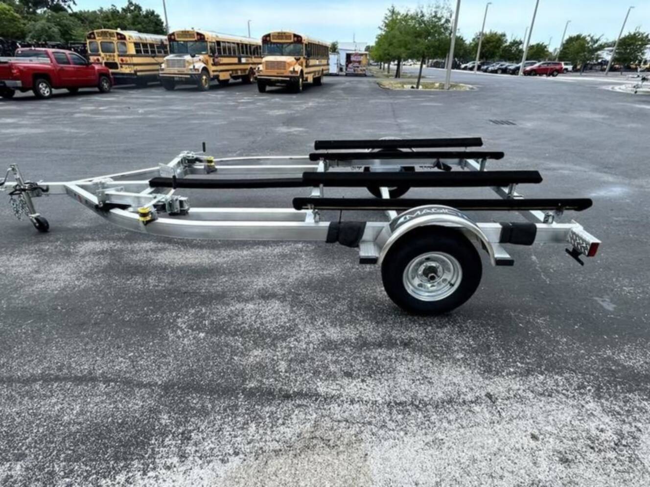 A photo of this 2025 Magic Tilt DOUBLE PWC TRAILER