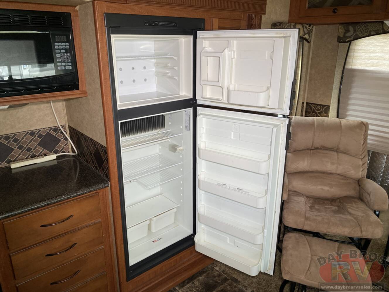 A photo of this 2012 Heartland Greystone 29MK
