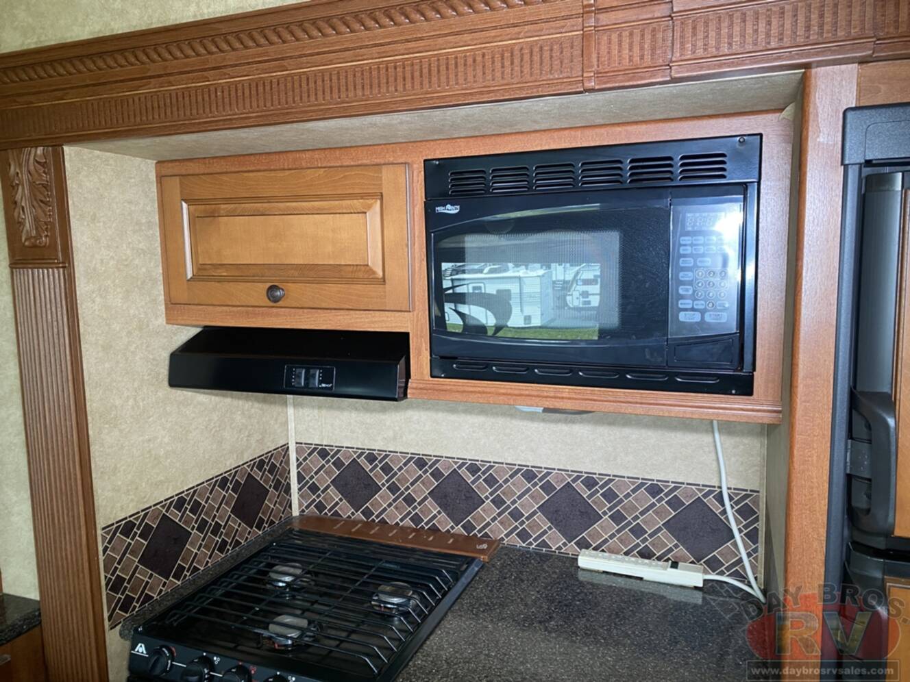 A photo of this 2012 Heartland Greystone 29MK