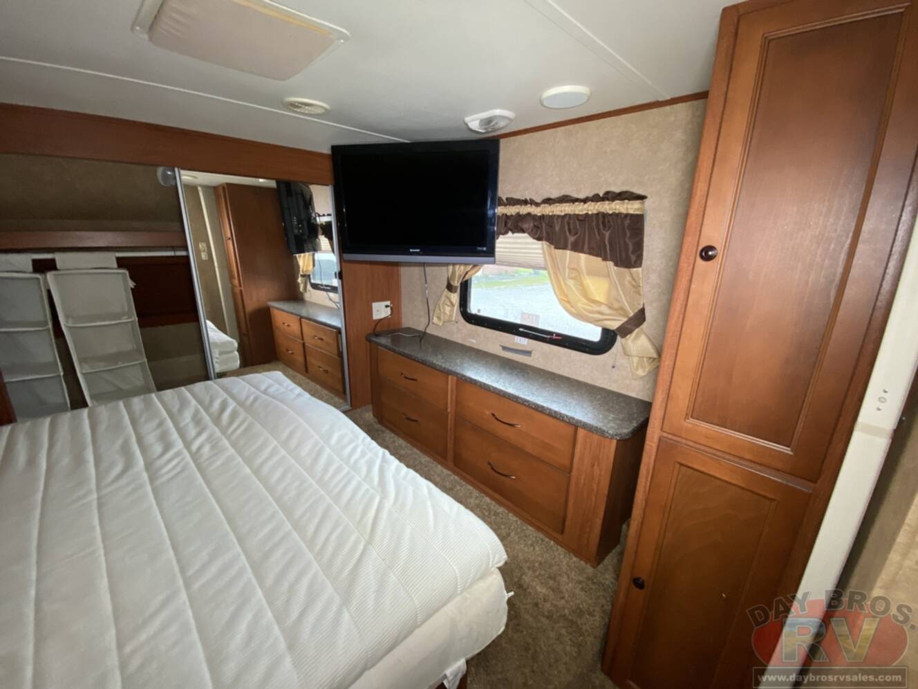A photo of this 2012 Heartland Greystone 29MK