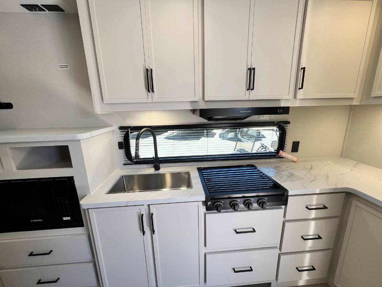 A photo of this 2026 Grand Design Momentum MAV 27MAV