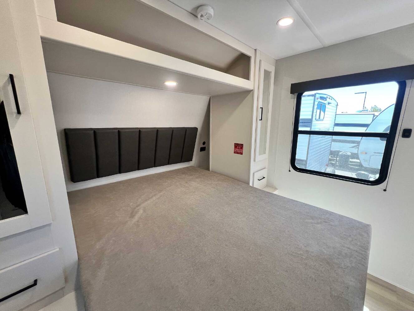 A photo of this 2026 Grand Design Momentum MAV 27MAV
