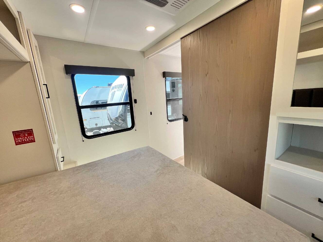 A photo of this 2026 Grand Design Momentum MAV 27MAV