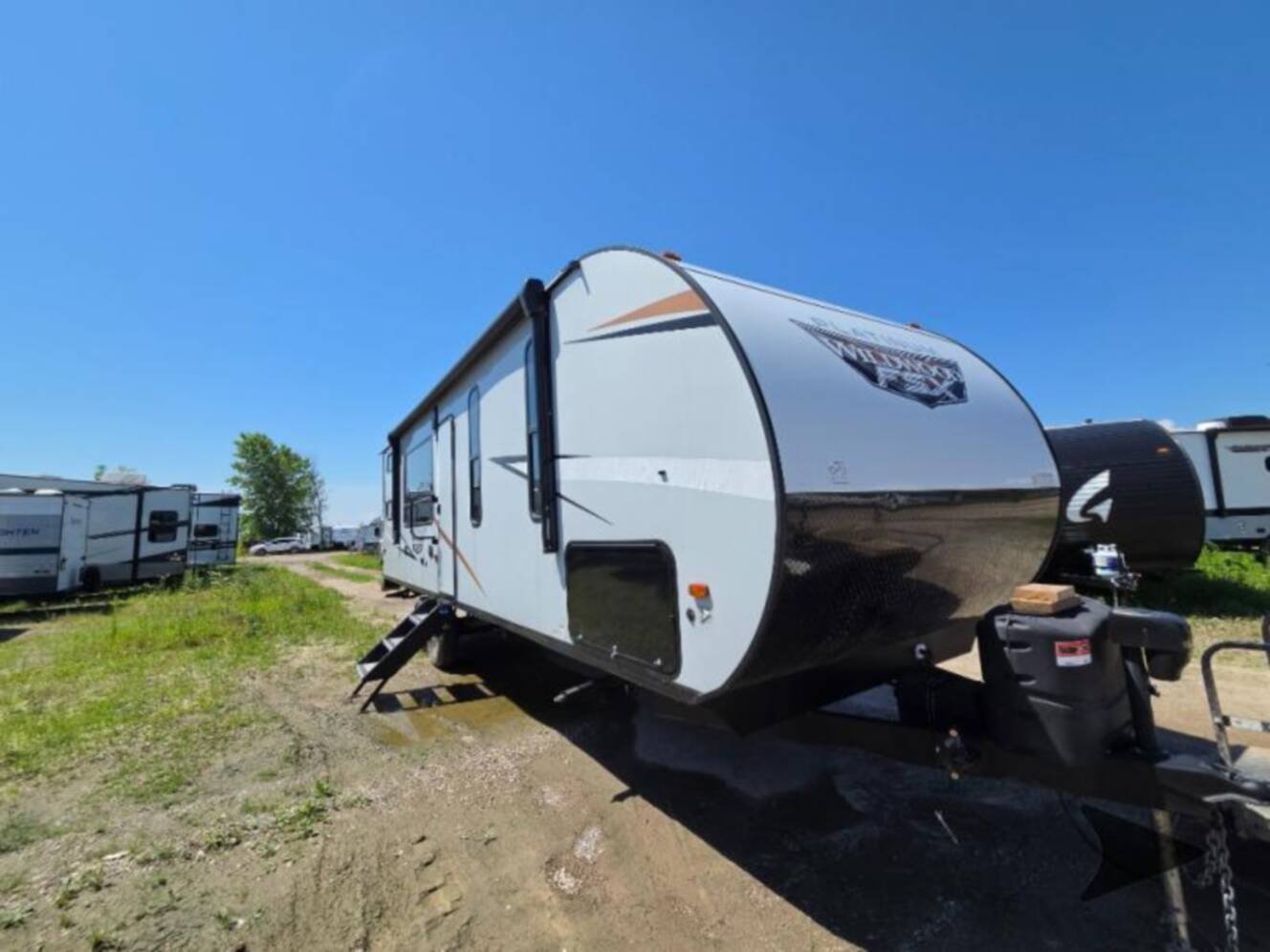 A photo of this 2022 Forest River Rv WILDWOOD FSX PLATINUM 270RTKX