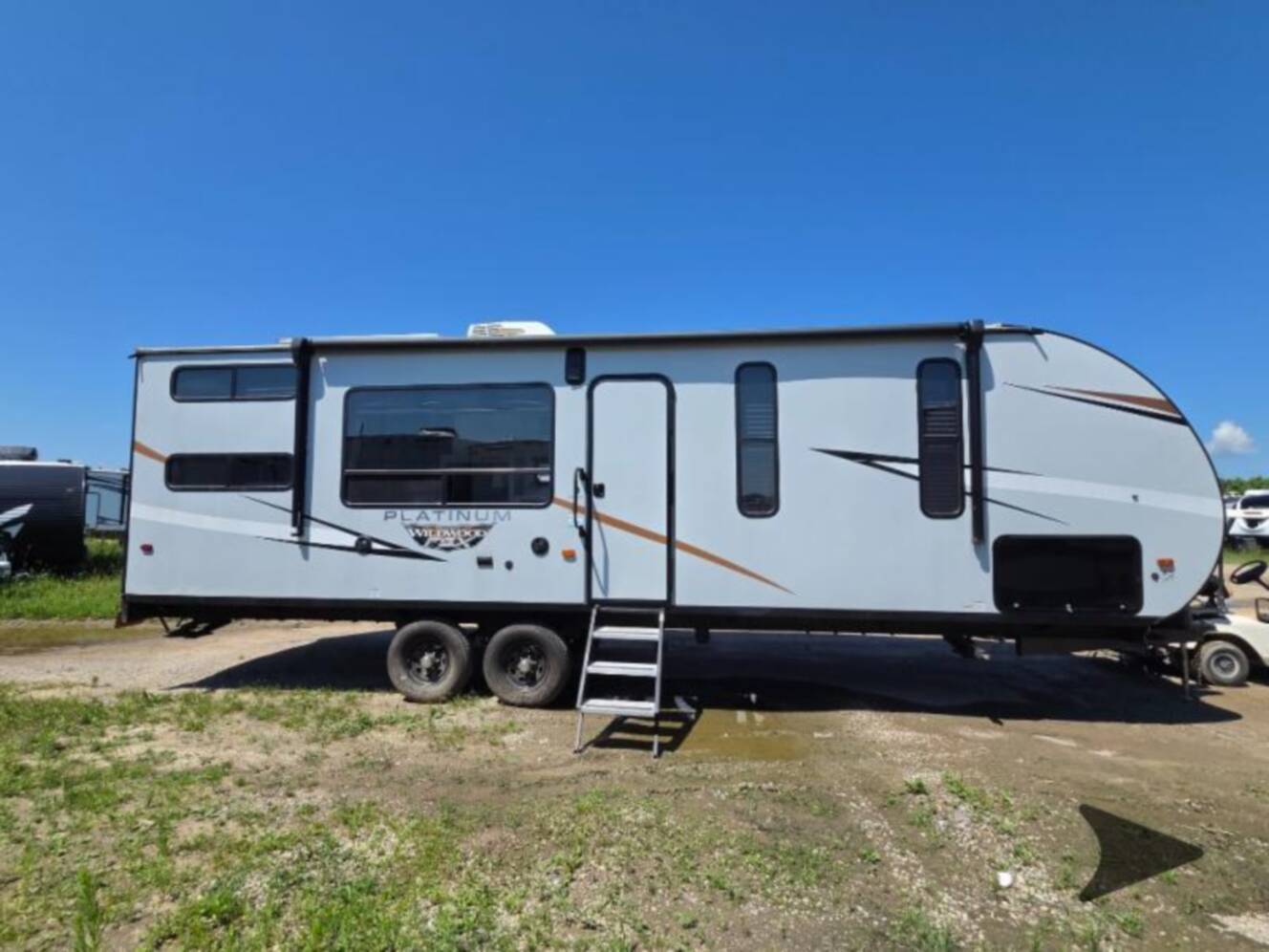 A photo of this 2022 Forest River Rv WILDWOOD FSX PLATINUM 270RTKX