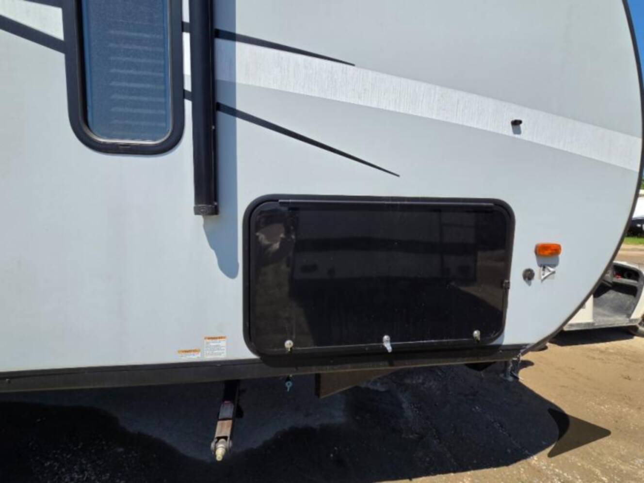 A photo of this 2022 Forest River Rv WILDWOOD FSX PLATINUM 270RTKX