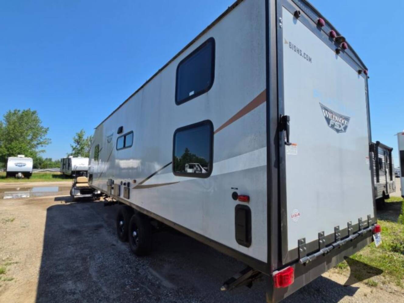 A photo of this 2022 Forest River Rv WILDWOOD FSX PLATINUM 270RTKX