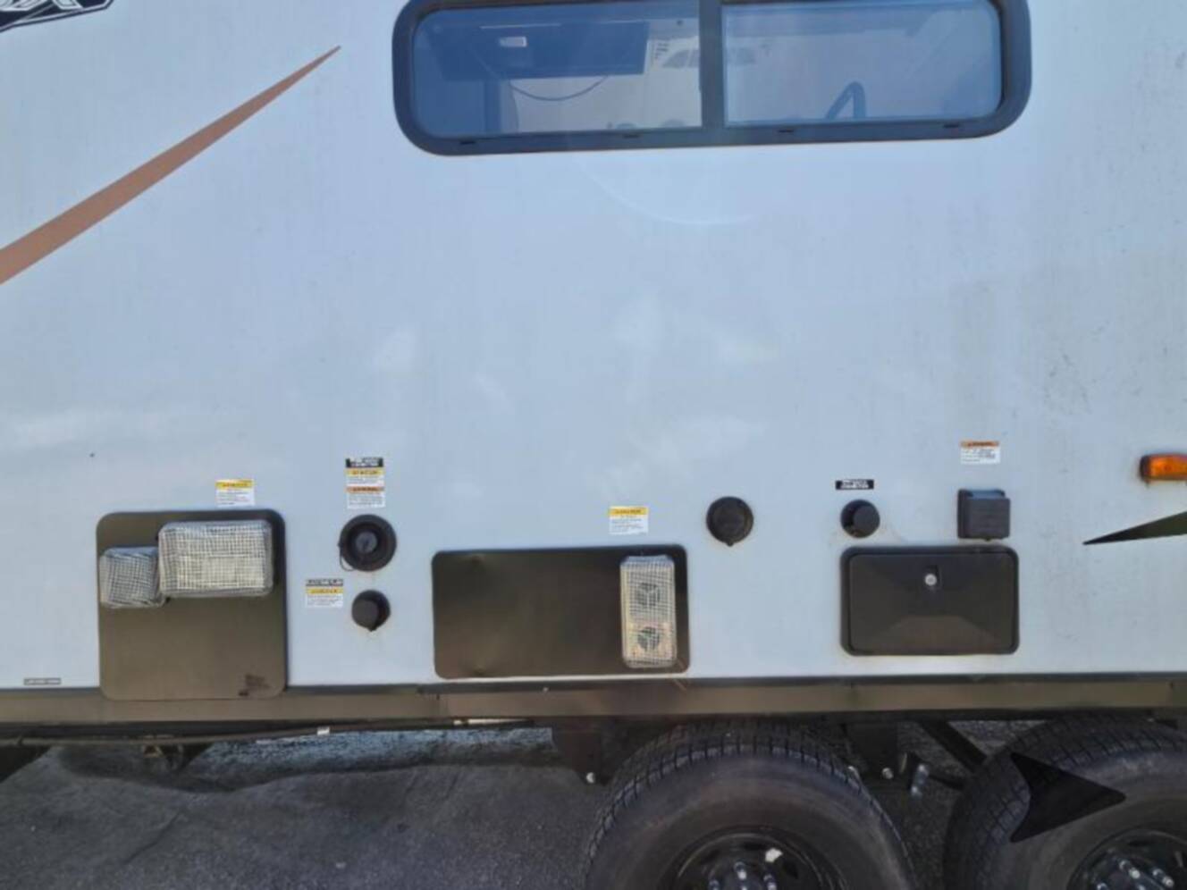 A photo of this 2022 Forest River Rv WILDWOOD FSX PLATINUM 270RTKX