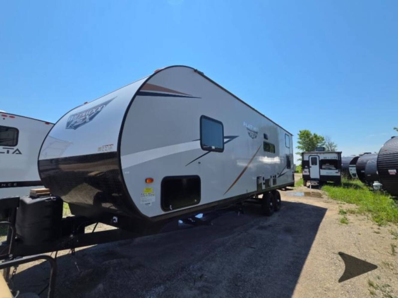 A photo of this 2022 Forest River Rv WILDWOOD FSX PLATINUM 270RTKX