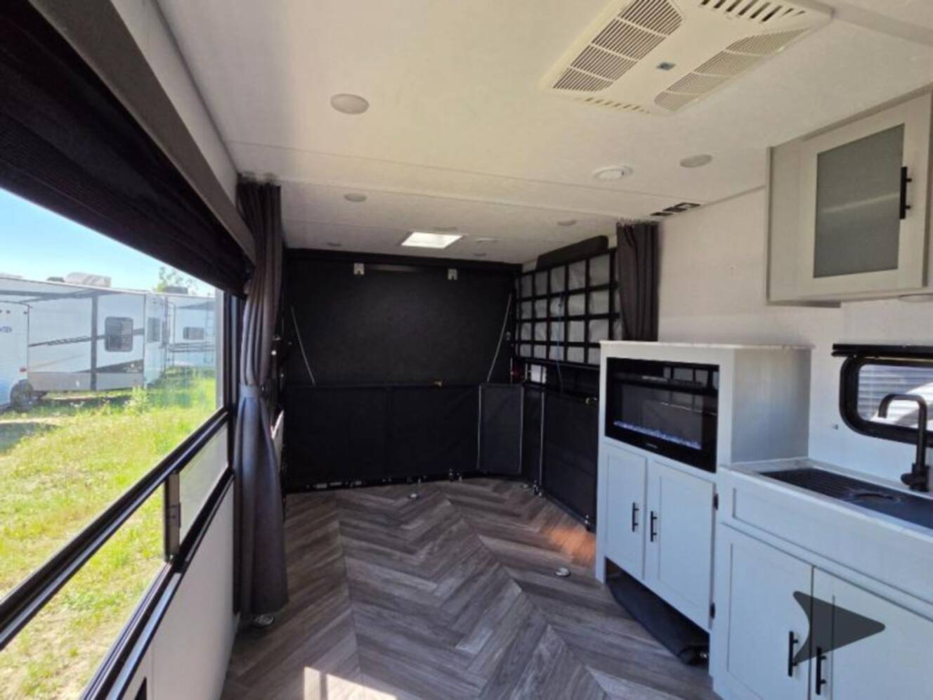 A photo of this 2022 Forest River Rv WILDWOOD FSX PLATINUM 270RTKX