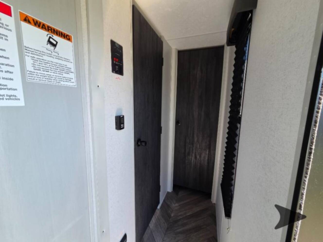 A photo of this 2022 Forest River Rv WILDWOOD FSX PLATINUM 270RTKX
