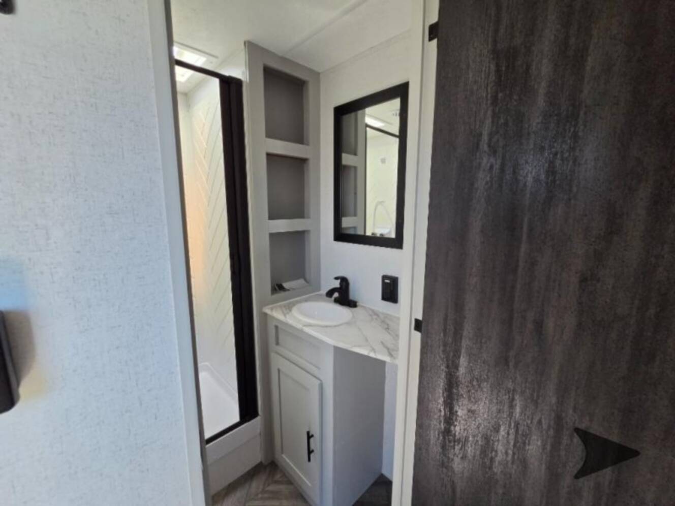 A photo of this 2022 Forest River Rv WILDWOOD FSX PLATINUM 270RTKX