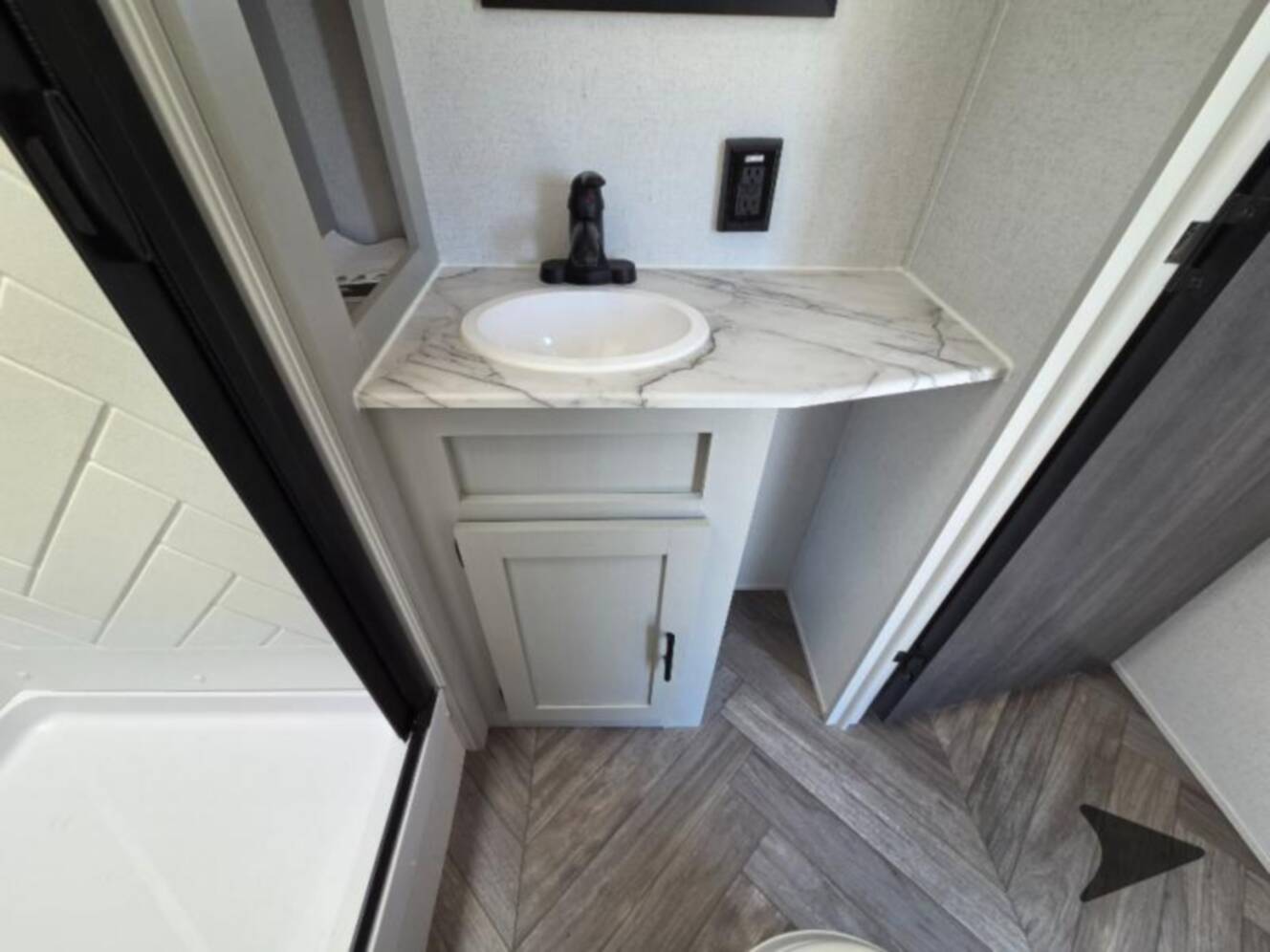 A photo of this 2022 Forest River Rv WILDWOOD FSX PLATINUM 270RTKX