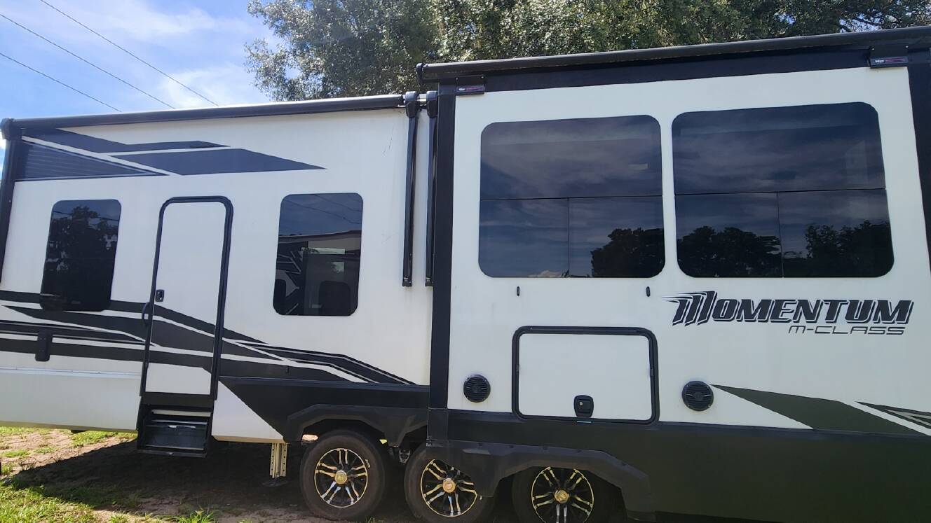 A photo of this 2023 Grand Design MOMENTUM 381MS