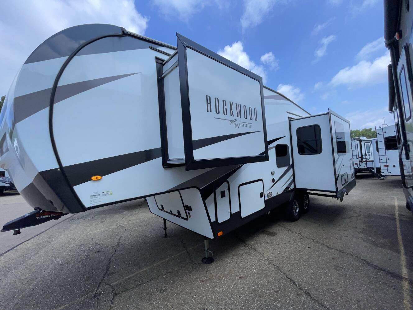A photo of this 2024 Forest River ROCKWOOD SIGNATURE 301RK