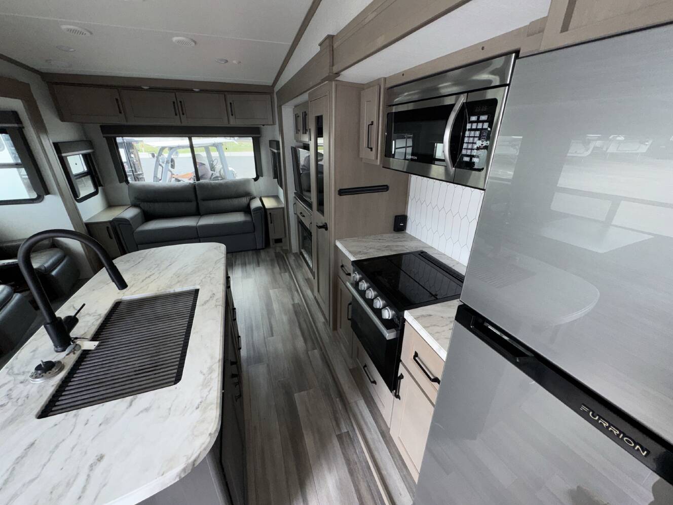 A photo of this 2023 Grand Design REFLECTION 150 SERIES 295RL