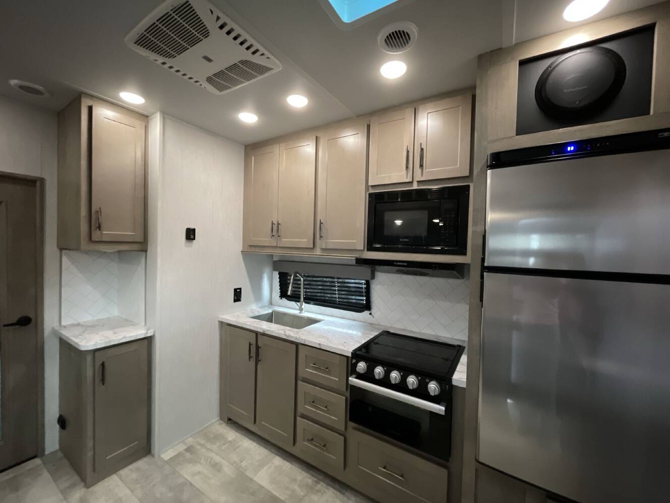 A photo of this 2023 Grand Design MOMENTUM G CLASS 29G