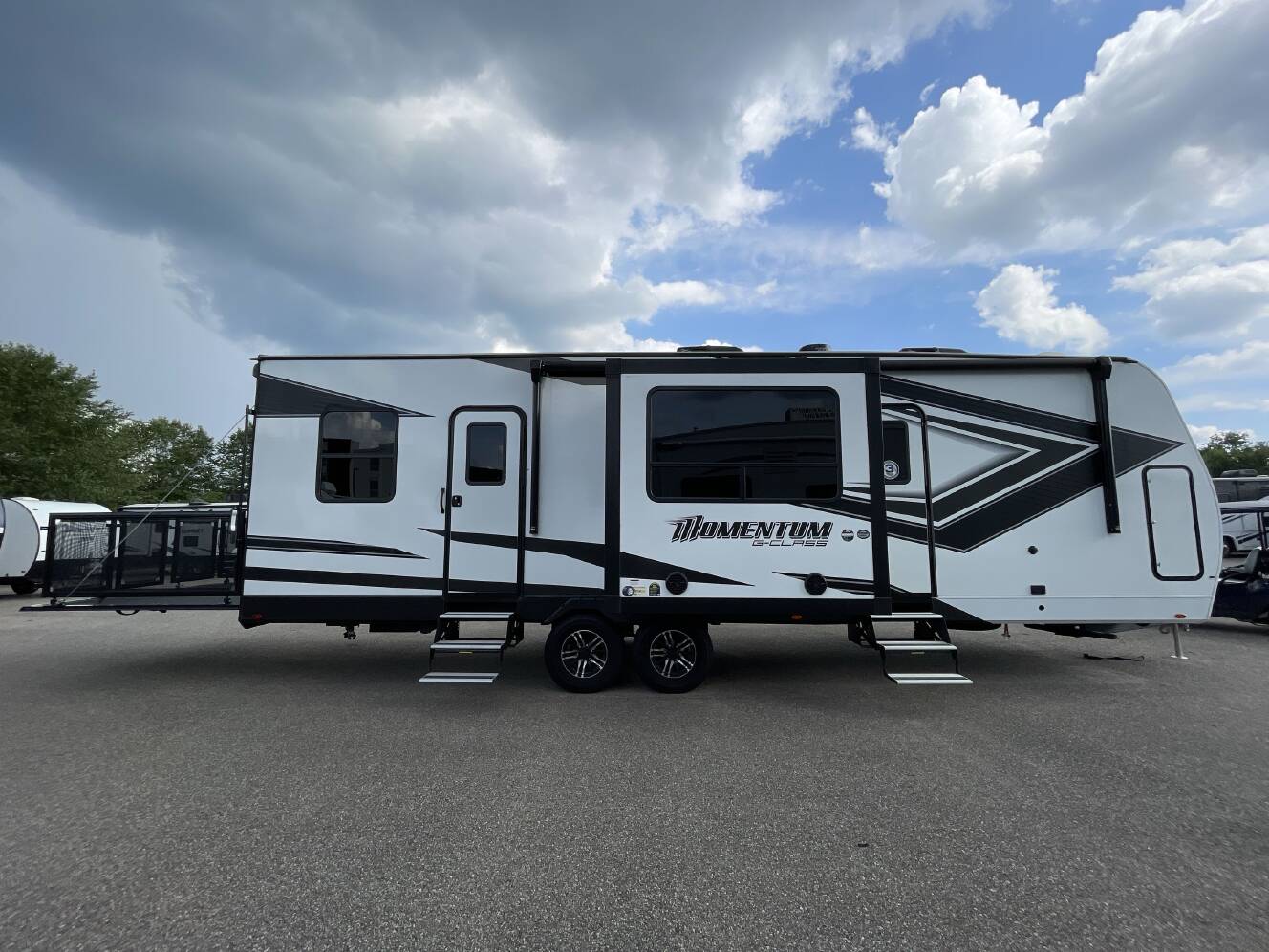 A photo of this 2023 Grand Design MOMENTUM G CLASS 29G