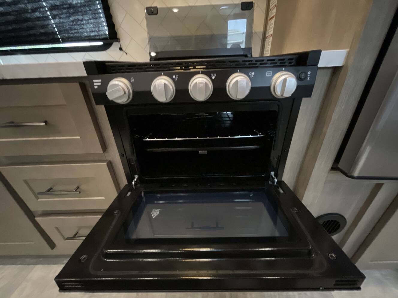 A photo of this 2023 Grand Design MOMENTUM G CLASS 29G