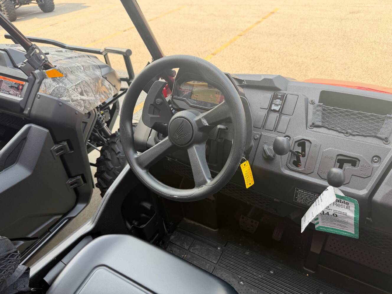 A photo of this 2026 Honda Pioneer 700 Deluxe