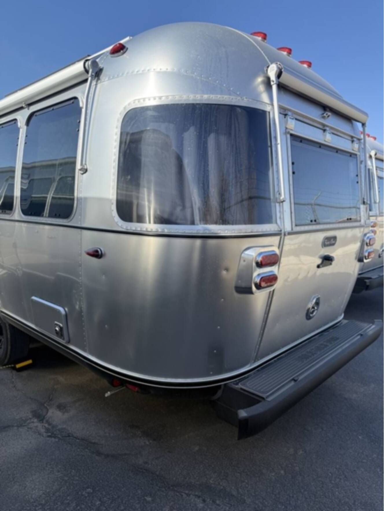 A photo of this 2026 Airstream Midnight Flamingo Flying Cloud 27FB