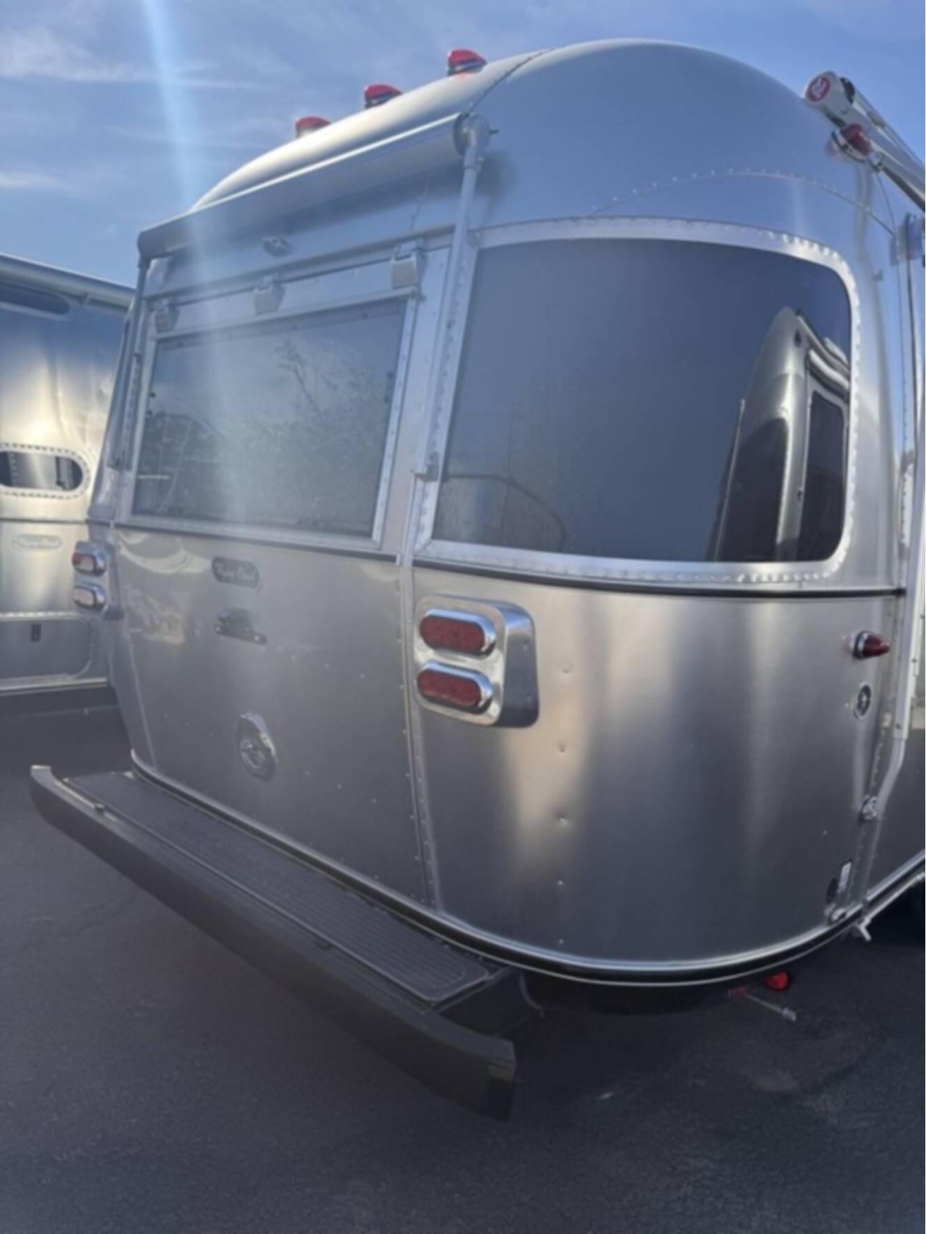 A photo of this 2026 Airstream Midnight Flamingo Flying Cloud 27FB