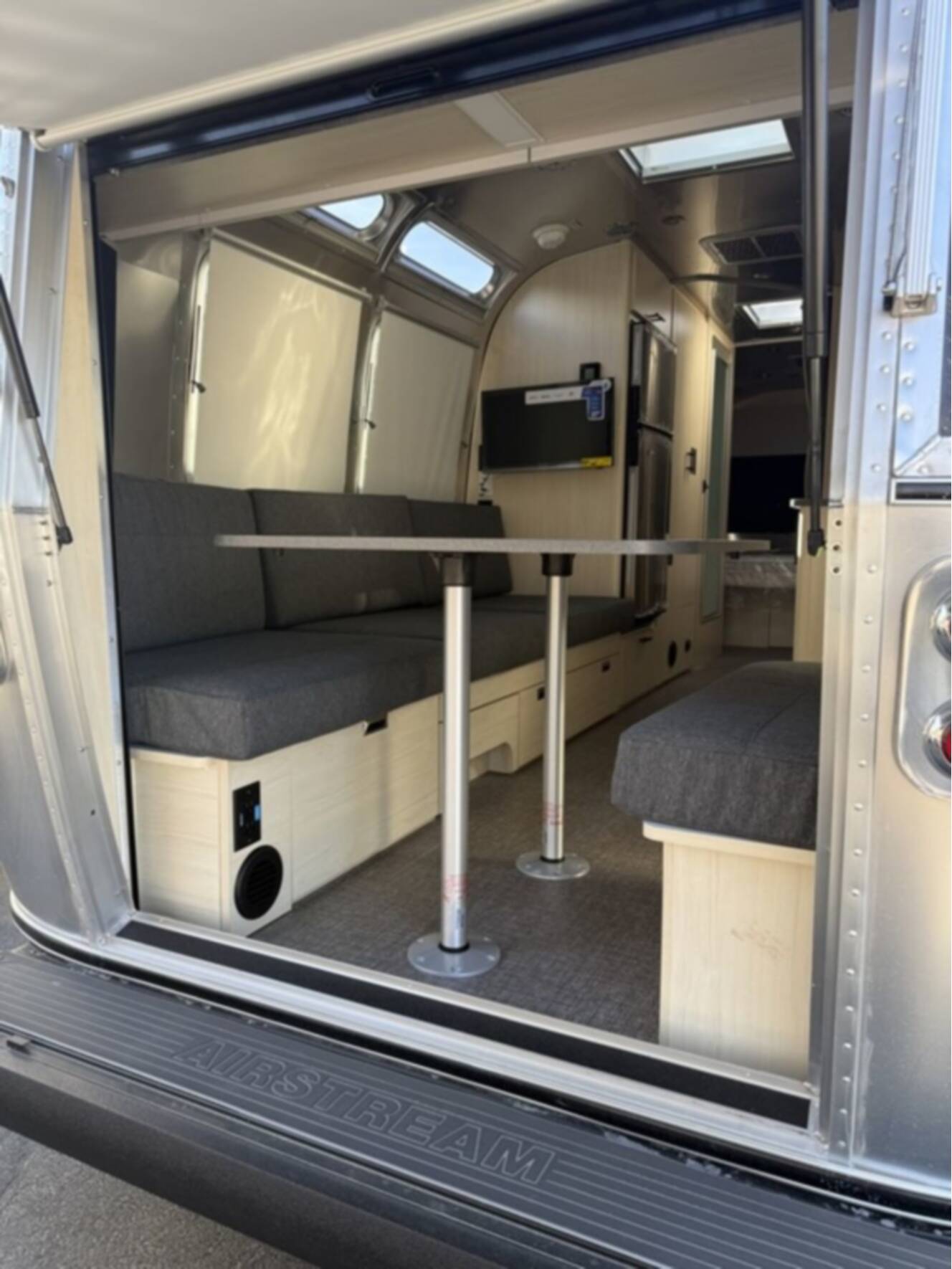 A photo of this 2026 Airstream Midnight Flamingo Flying Cloud 27FB