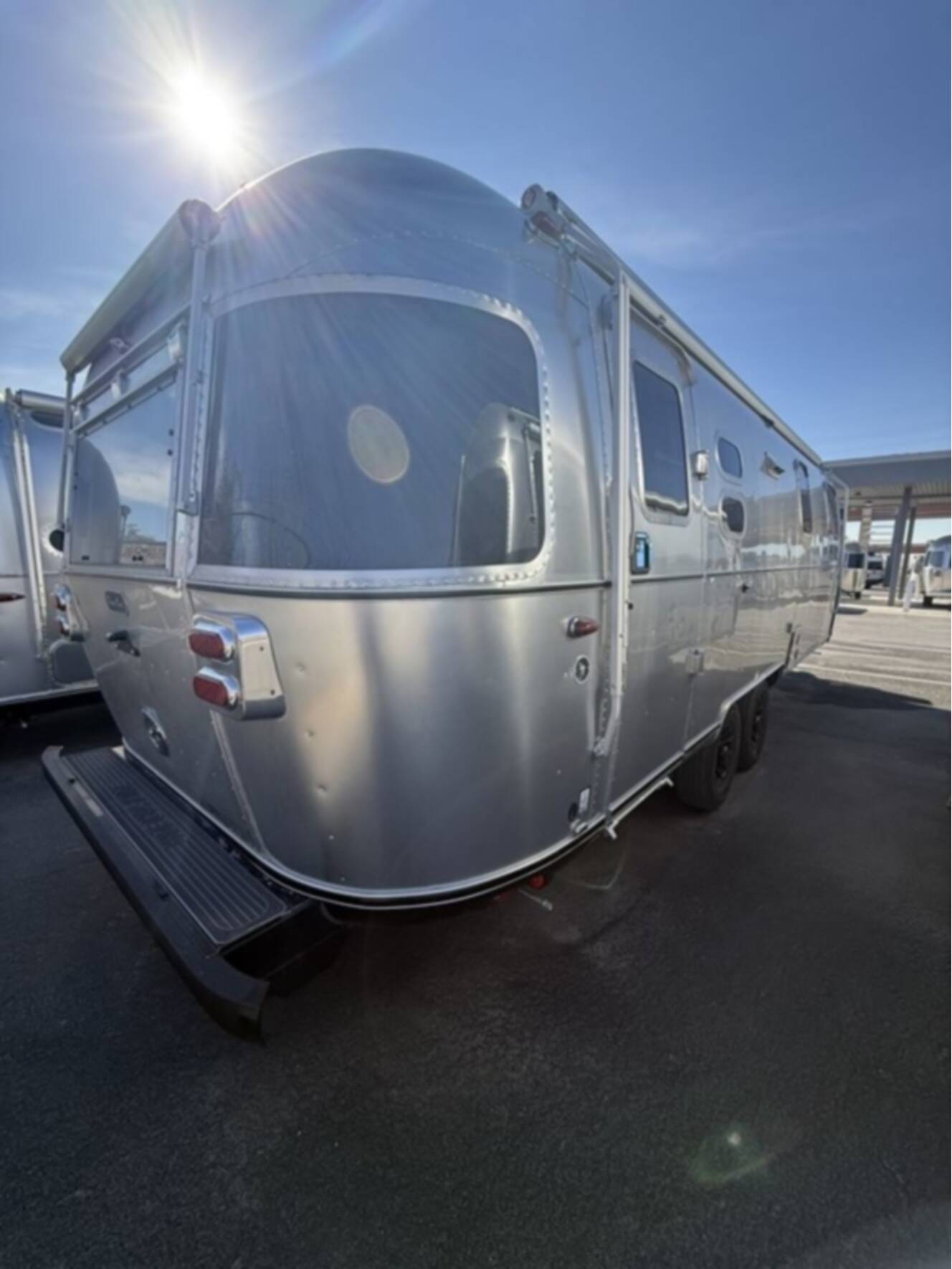 A photo of this 2026 Airstream Midnight Flamingo Flying Cloud 27FB