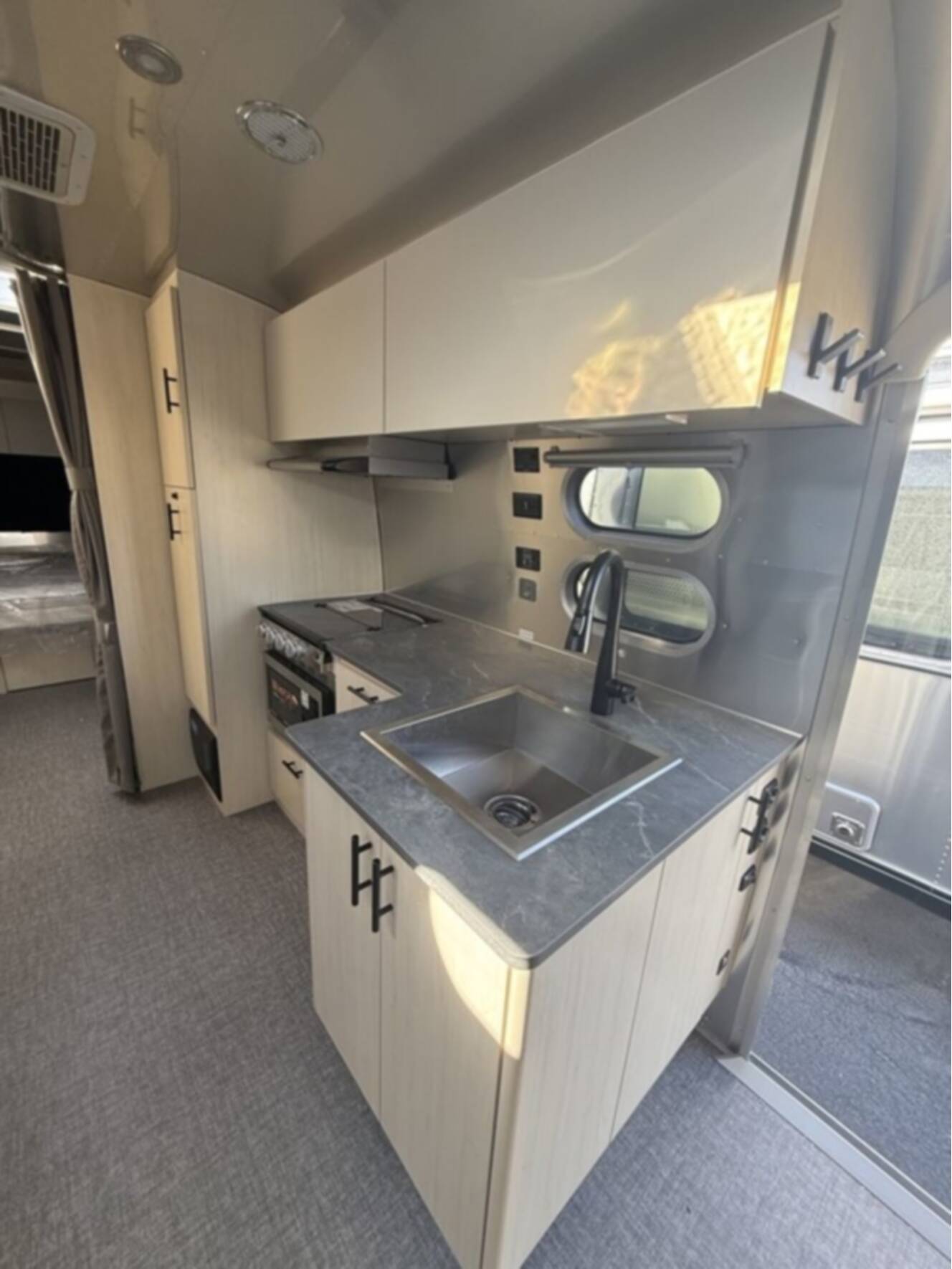 A photo of this 2026 Airstream Midnight Flamingo Flying Cloud 27FB