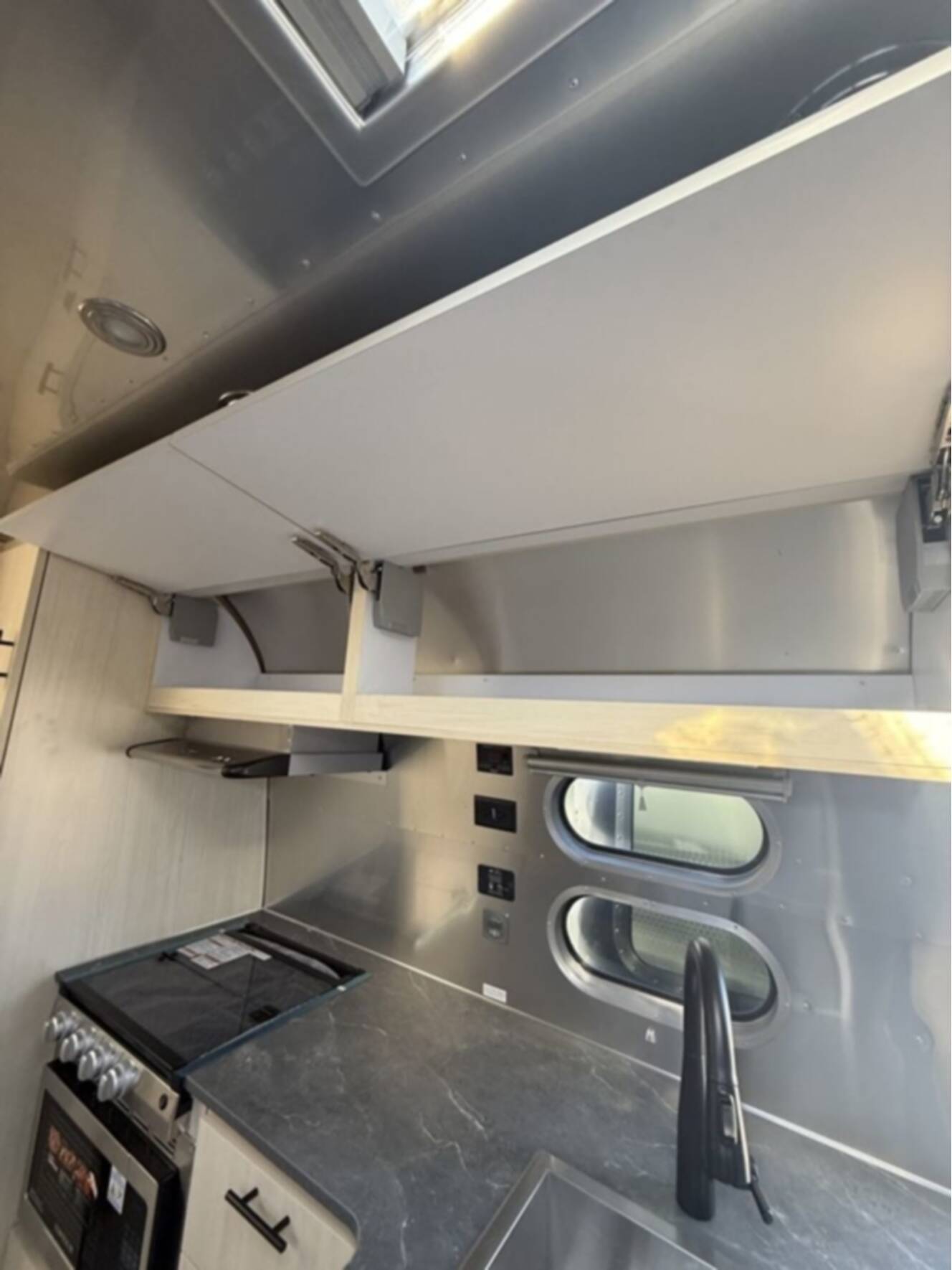 A photo of this 2026 Airstream Midnight Flamingo Flying Cloud 27FB