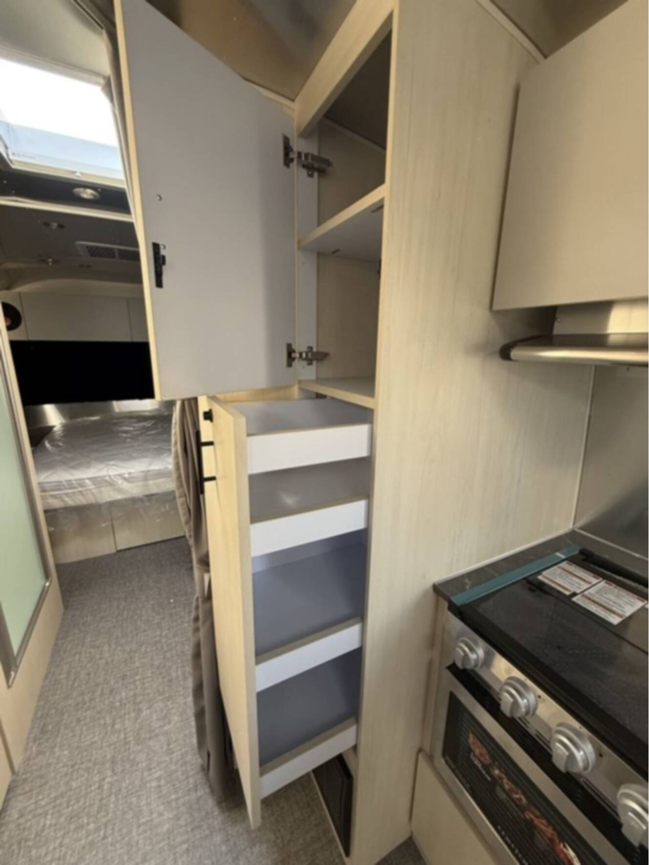 A photo of this 2026 Airstream Midnight Flamingo Flying Cloud 27FB