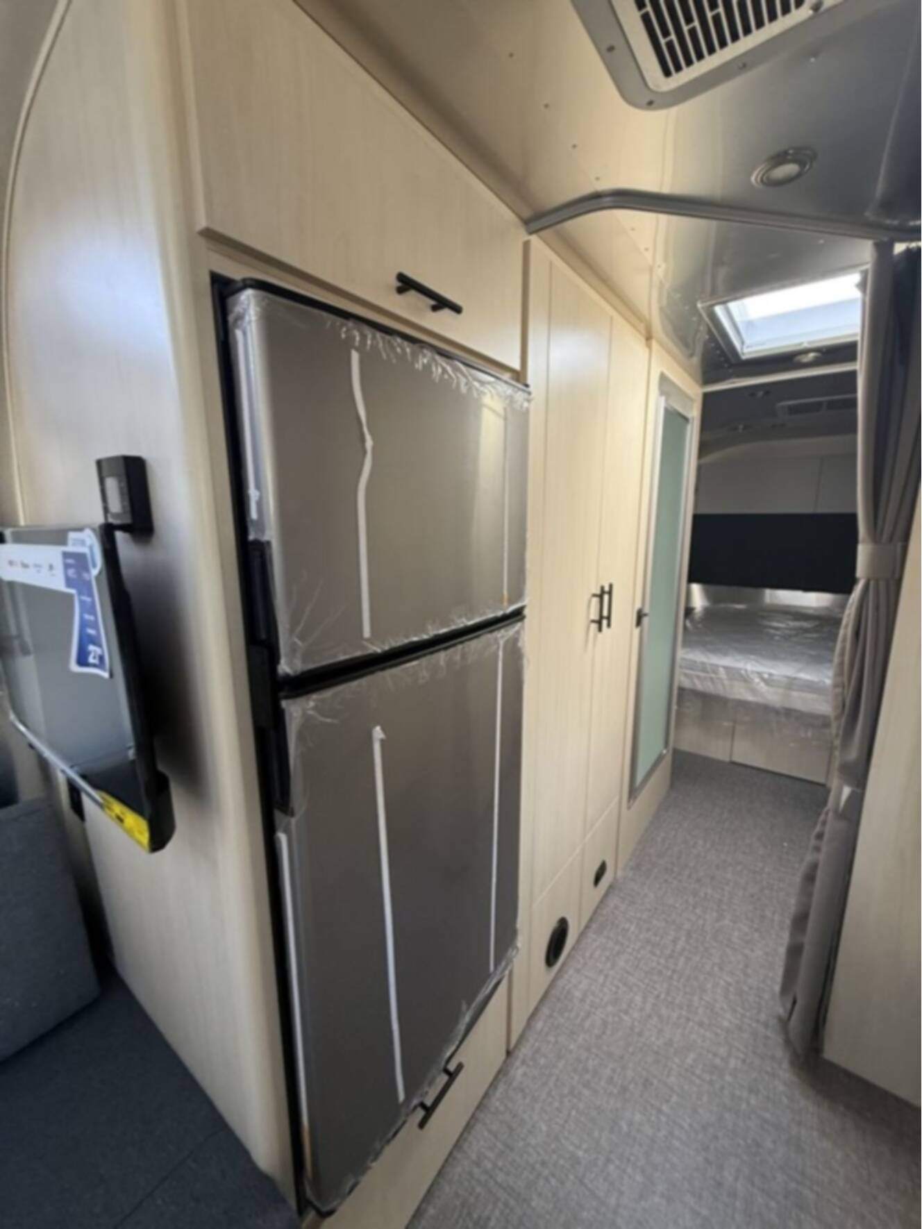 A photo of this 2026 Airstream Midnight Flamingo Flying Cloud 27FB
