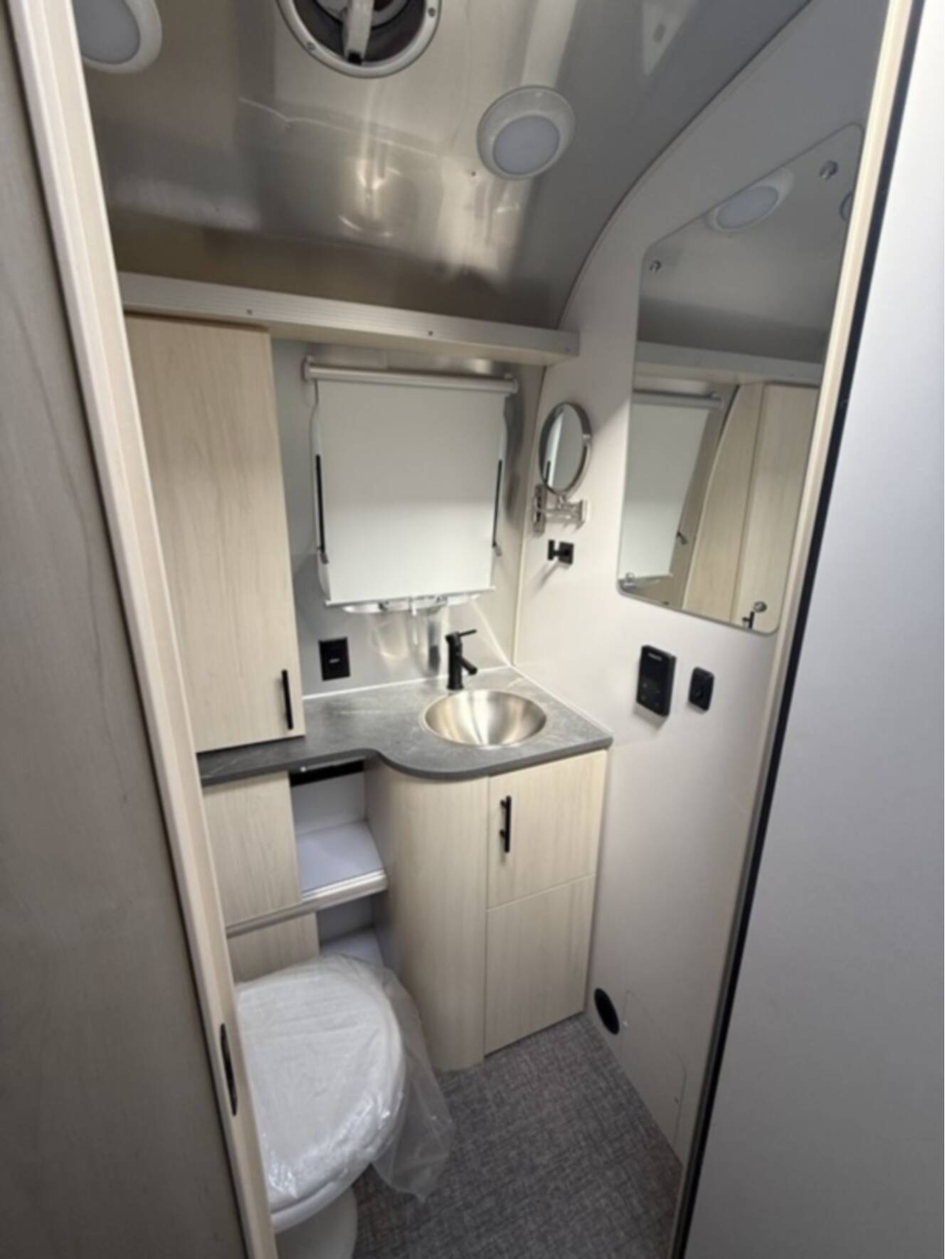A photo of this 2026 Airstream Midnight Flamingo Flying Cloud 27FB