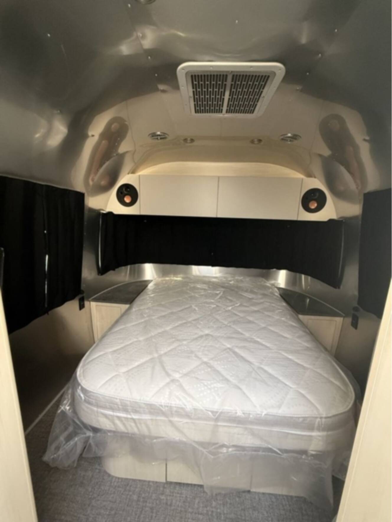 A photo of this 2026 Airstream Midnight Flamingo Flying Cloud 27FB