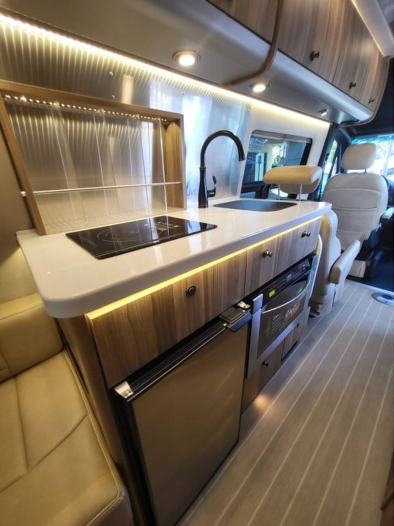 A photo of this 2023 Airstream Interstate 24GL 4x4 Tommy Bahama