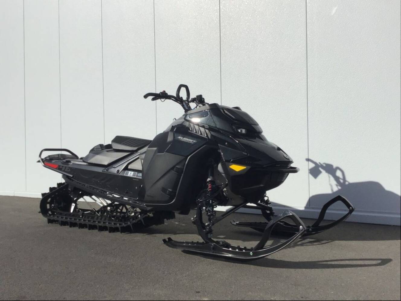 A photo of this 2025 Ski-Doo Summit® Adrenaline® with Edge Package 850 E-TEC 146 S