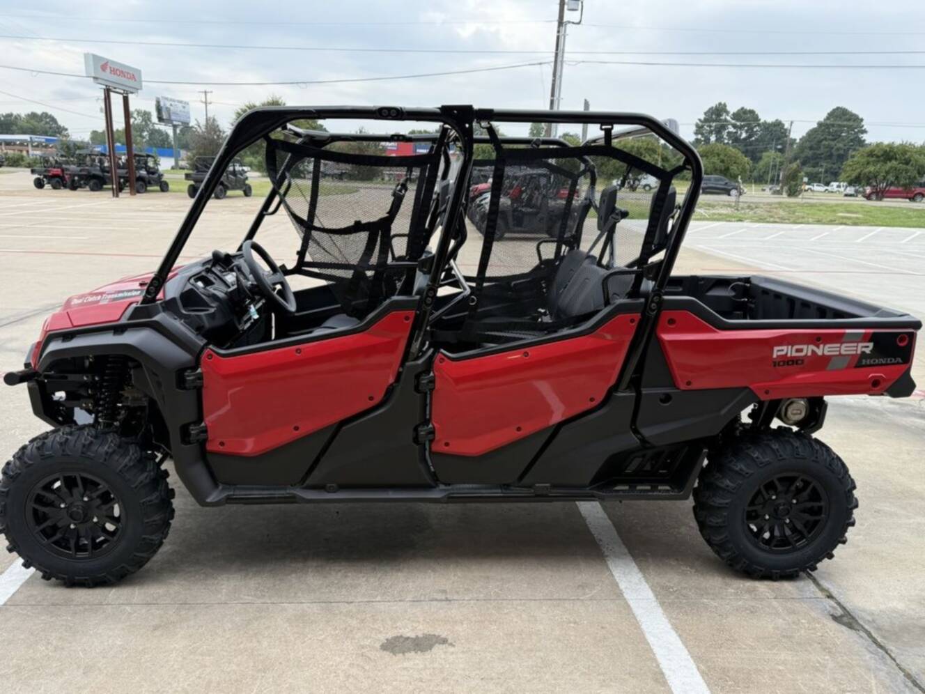 A photo of this 2025 Honda® Pioneer 1000-6 Deluxe Crew