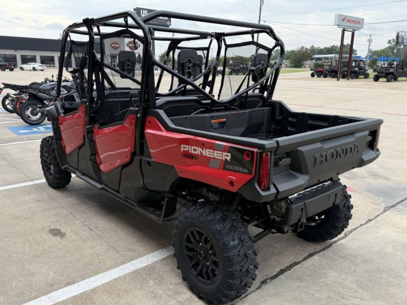 A photo of this 2025 Honda® Pioneer 1000-6 Deluxe Crew