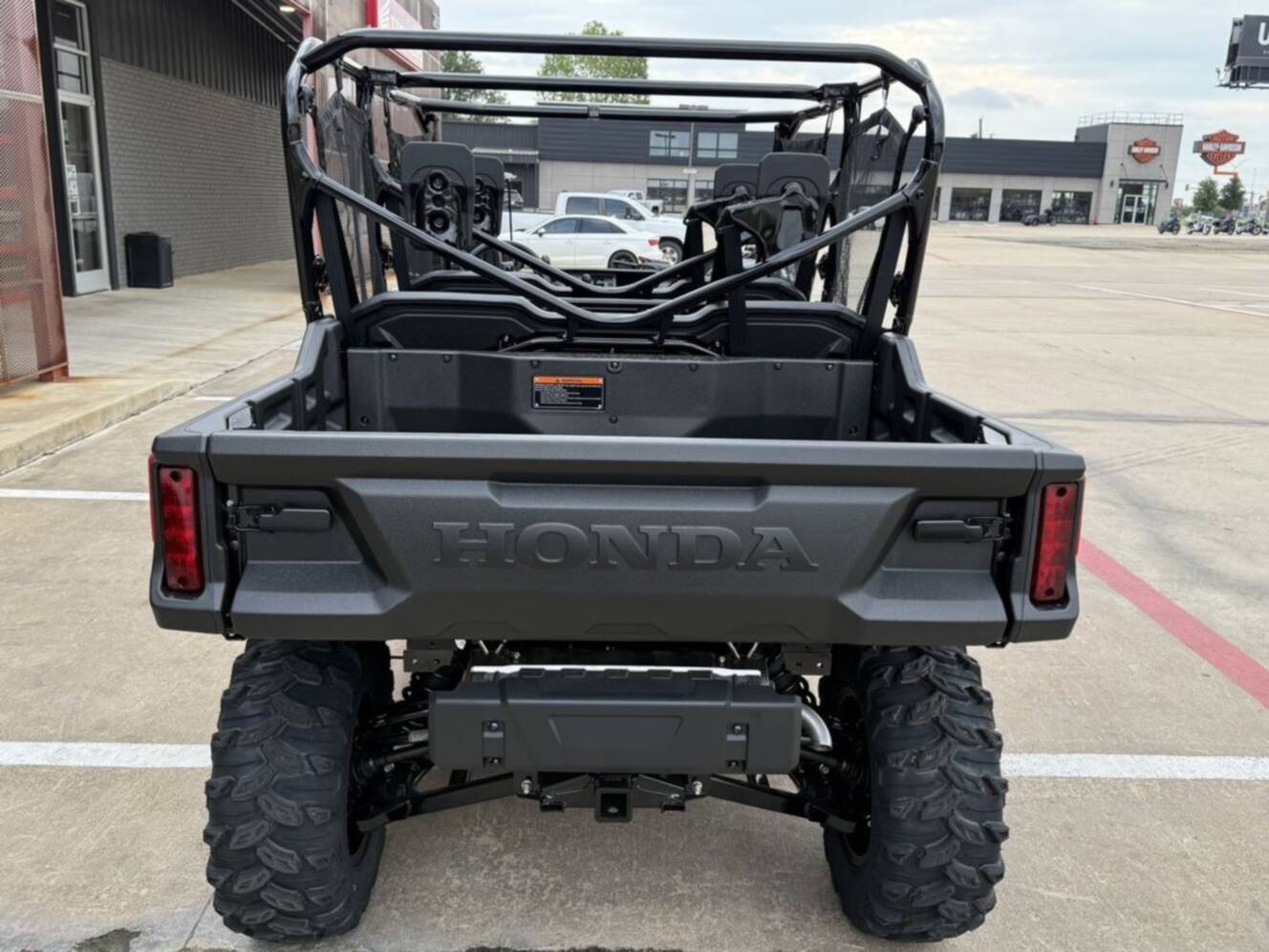 A photo of this 2025 Honda® Pioneer 1000-6 Deluxe Crew