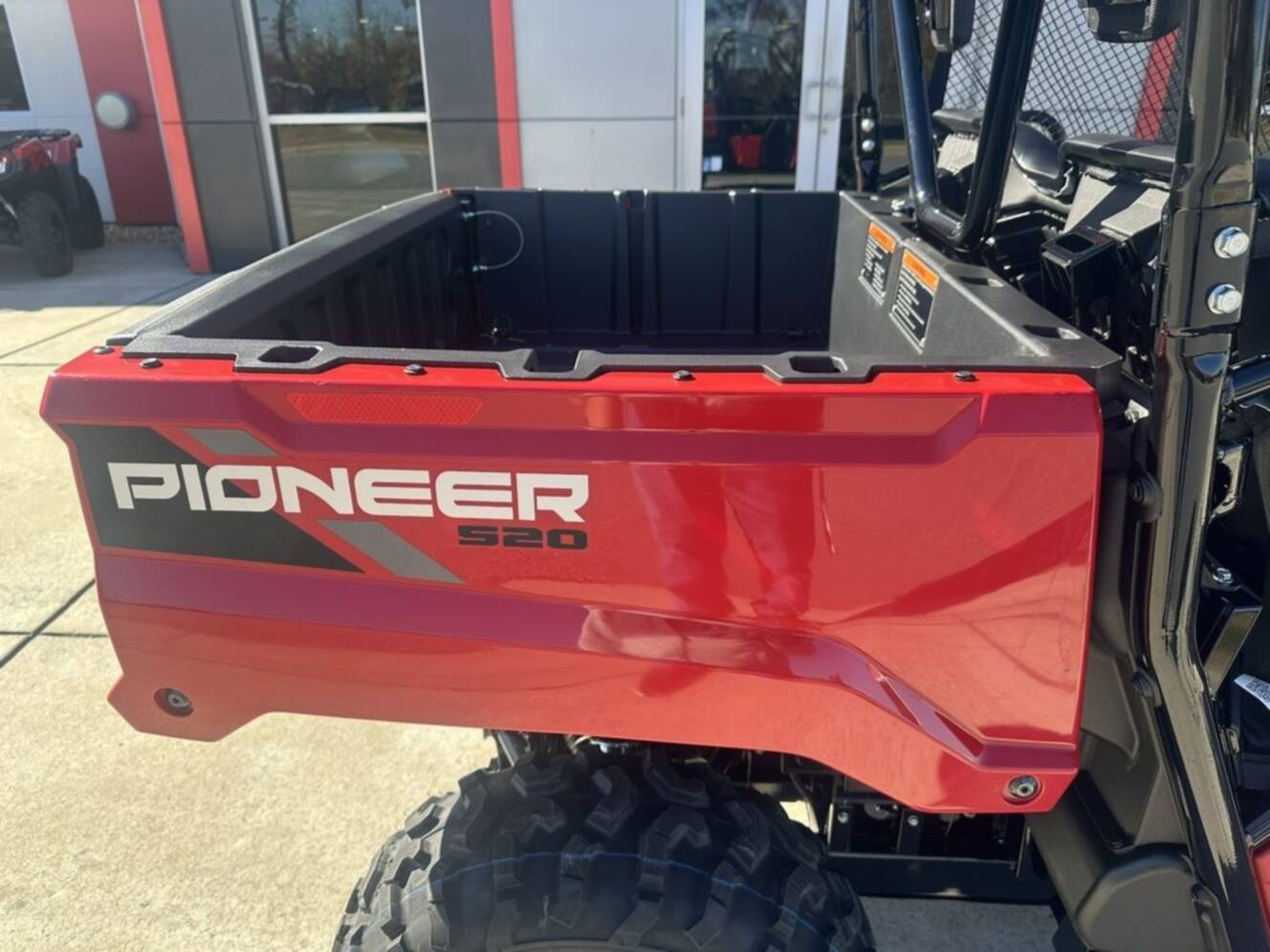 A photo of this 2026 Honda® Pioneer 520