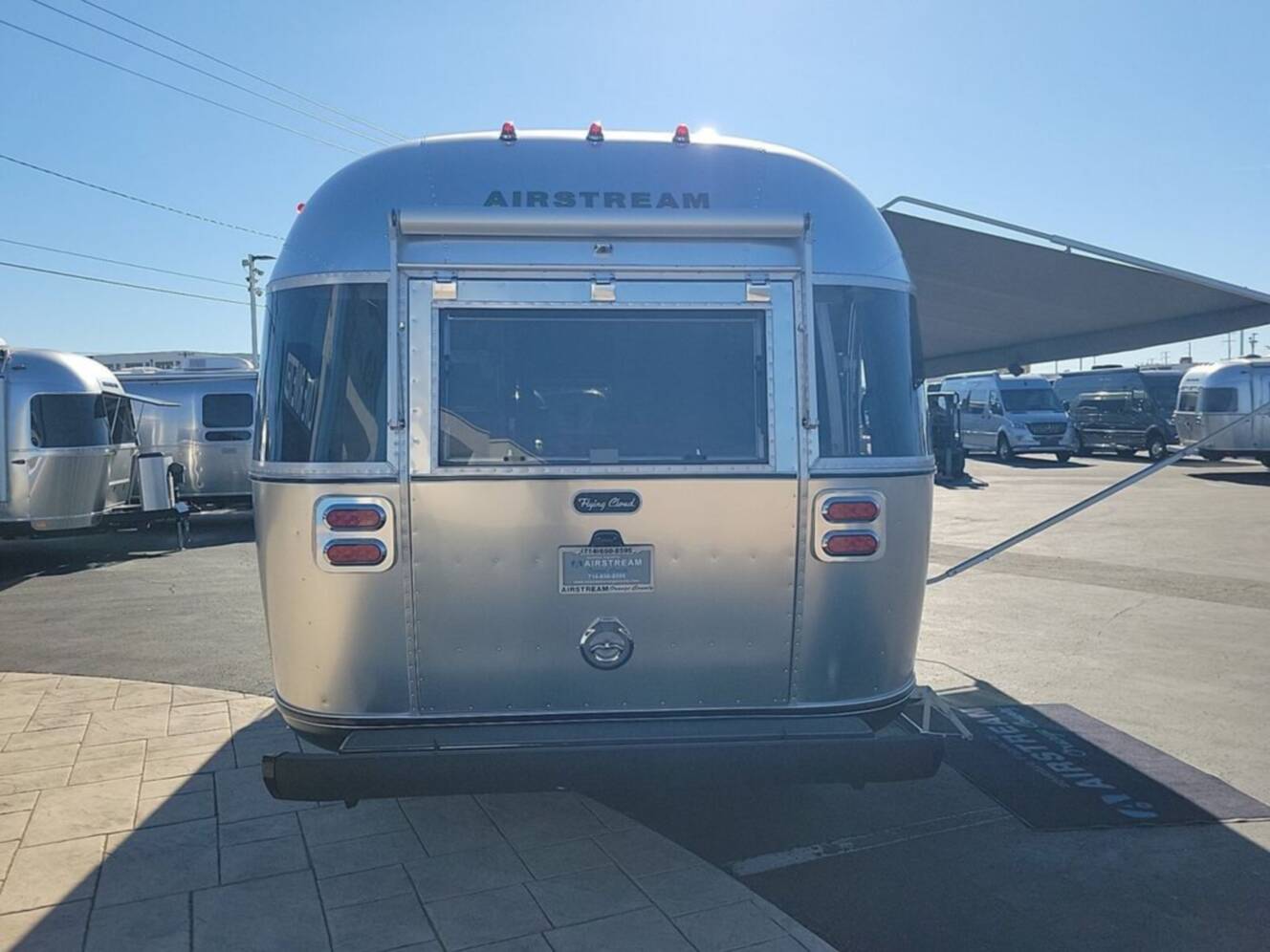 A photo of this 2026 Airstream Flying Cloud ® 25FB Midnight Flamingo